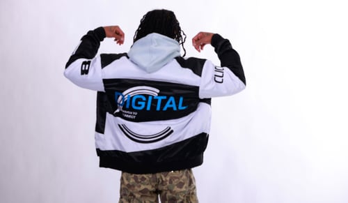 man wearing a digitalc bomber jacket