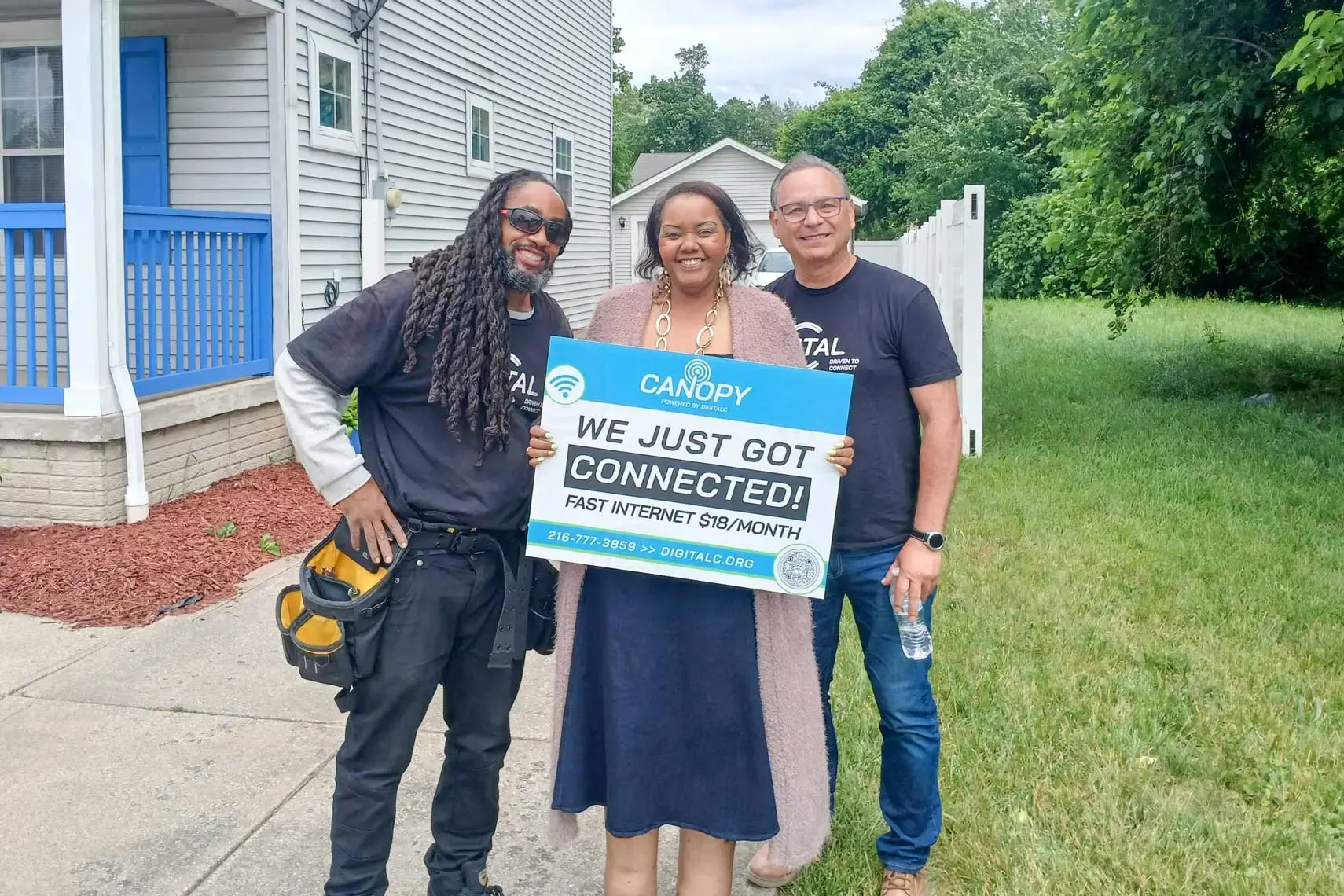 A Canopy customer with a yard sign